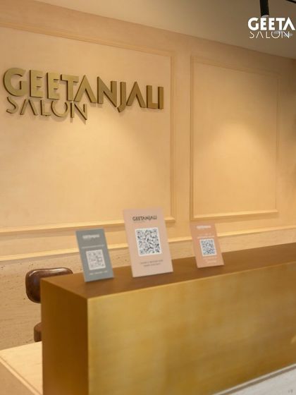 The clean, modern reception desk at our new Bhubaneswar salon, where your pampering session begins.