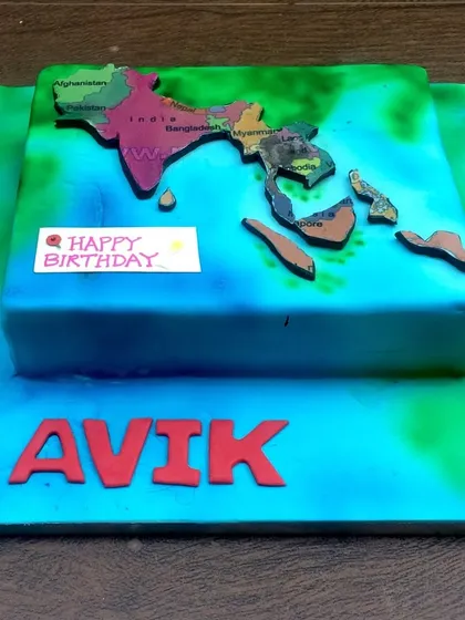 A birthday cake featuring a map of India and neighboring countries, perfect for someone with a love for geography and their homeland.