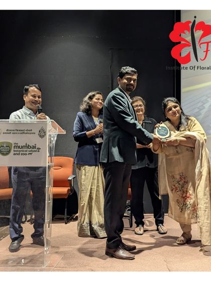 A moment of recognition at the Rani Baug Flower Exhibition. Our team is honored to be felicitated on stage for our contribution and for conducting an engaging floral design workshop for a passionate audience.