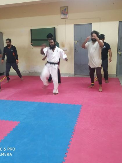 Leg conditioning drills on the mat. We prepare our bodies for the impact of full contact fighting.