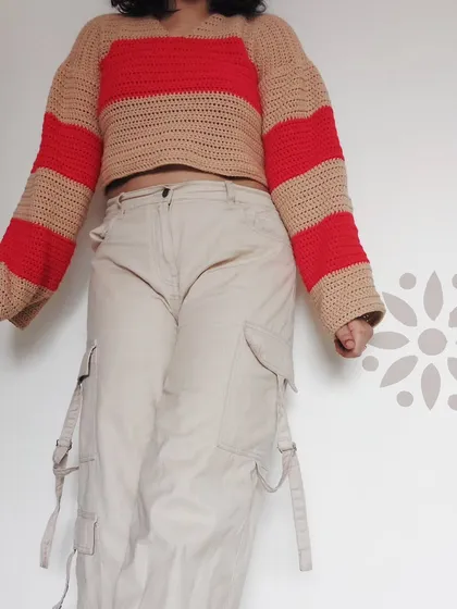 A full-length view showing the oversized fit and striking color blocks of the Cotton Candy Sweater.