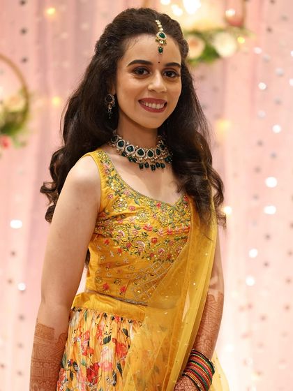 A close-up of the sangeet makeup, showing the defined eyes and glowing skin that will last through a night of dancing.