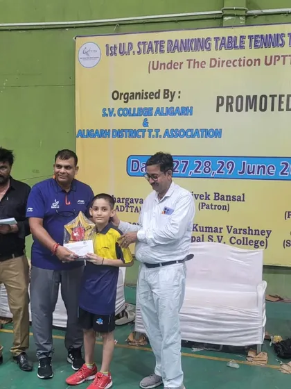 Aryaveer Borah being felicitated for his win in the U-11 Boys category at the 1st UP State Ranking Tournament.