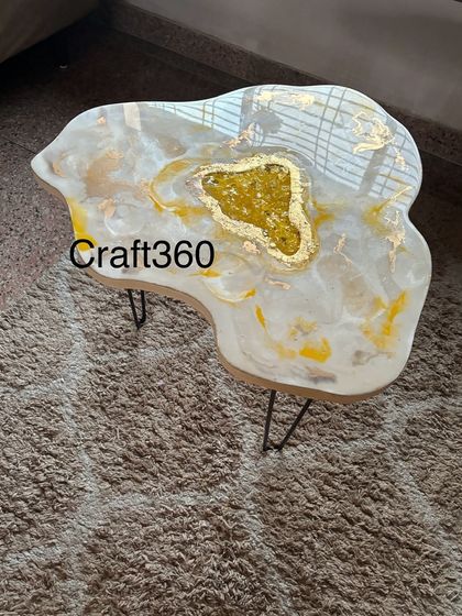 Another view of the custom geode coffee table, showing the beautiful reflections on its glossy surface. This piece was made by a talented student in one of my workshops.