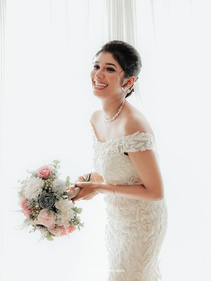 A joyful, laughing portrait of the bride, Shilpa. Her radiant happiness is contagious, and capturing these moments of pure bliss is my passion.