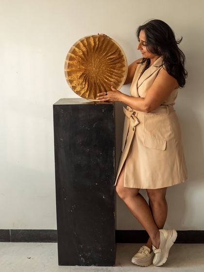 My art and me, always evolving. "The Golden Flower" is a perfect example of this, a piece that can transform a space whether on a wall or a table.