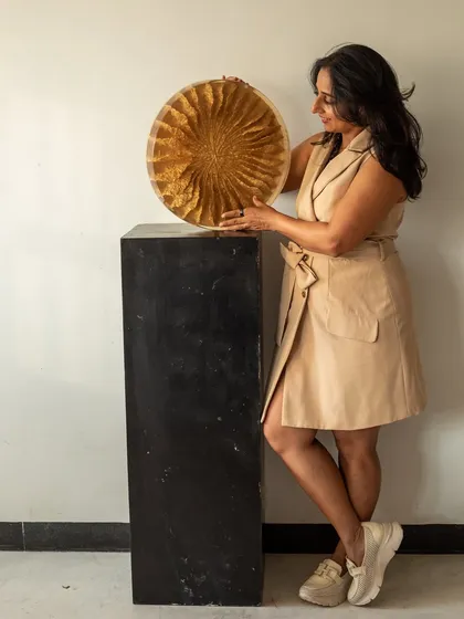 My art and me, always evolving. "The Golden Flower" is a perfect example of this, a piece that can transform a space whether on a wall or a table.
