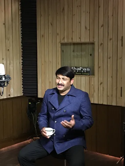 Between takes, our studio offers a comfortable and creative atmosphere for artists to relax. Manoj Tiwari ji enjoying a cup of tea during his session.