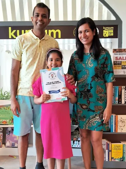 We love celebrating our readers' achievements with their families. It's a proud moment for everyone when a child earns their reading certificate through dedication and a love for stories.