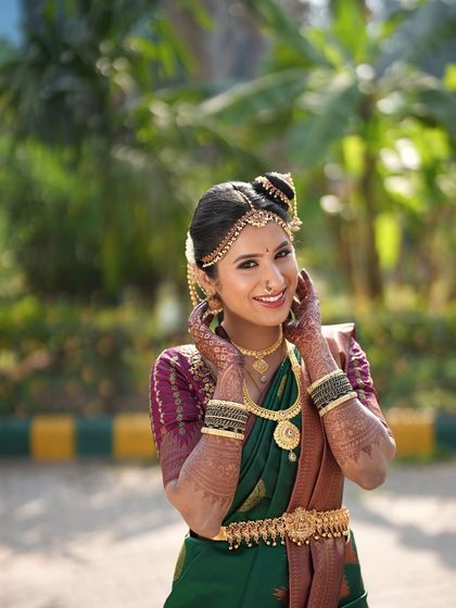 A happy bride on her wedding day. I love creating looks that make my clients smile. This traditional look features a neat updo and glowing makeup that enhances her joyful expression.