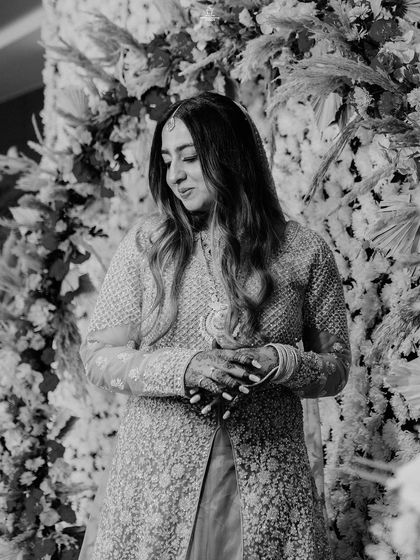 A duplicate of ID 117, this black and white portrait captures a Muslim bride's elegant and thoughtful expression.