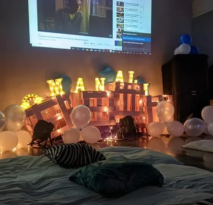 A movie screening party setup in our studio, complete with a projector, sound system, and cozy floor seating. Perfect for birthdays or private gatherings.