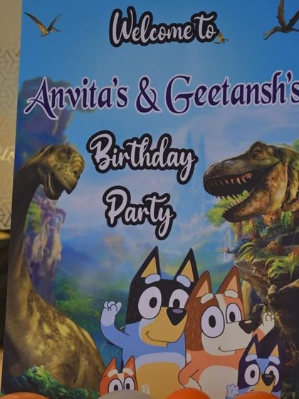 The welcome sign for a combined Bluey and Dinosaur themed birthday party, showcasing the custom design that merges both worlds.