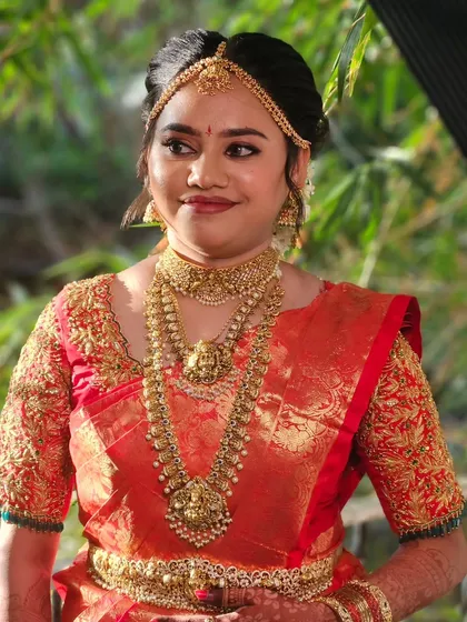 A candid shot of Archana during her wedding ceremony. Her makeup looks fresh and flawless even in natural lighting.