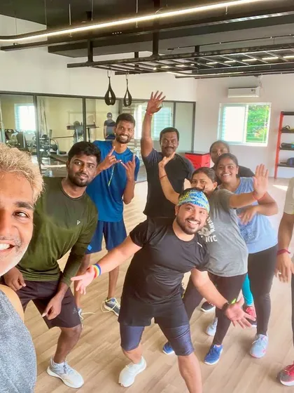 Waving goodbye after another amazing class. The camaraderie and shared energy make every session special.