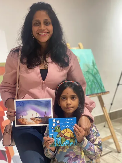 A mother and daughter duo, also seen in image 235, return for another fun art session together.