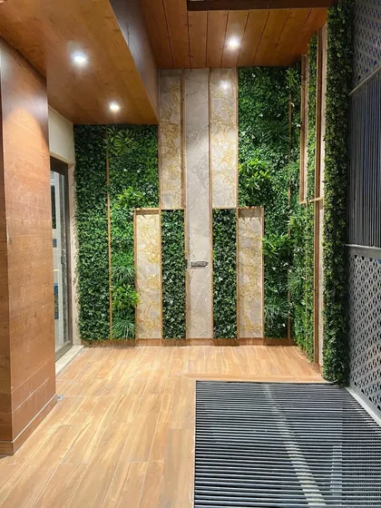 A full view of the completed balcony feature wall, which adds depth, color, and a strong design element to the outdoor space.