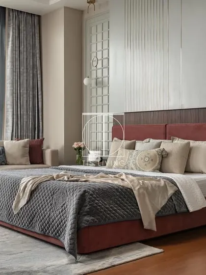 A master bedroom is a sanctuary, and we craft furniture that contributes to that peace. For this space, we manufactured the upholstered bed, side tables, and seating, focusing on a blend of textures like PU panels and wooden fluting to create a layered, tactile experience that feels both luxurious and comforting.