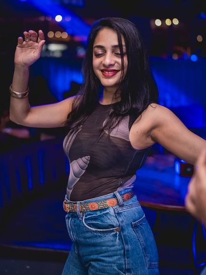 A guest dancing and enjoying the music. My sets are curated to make you want to move.