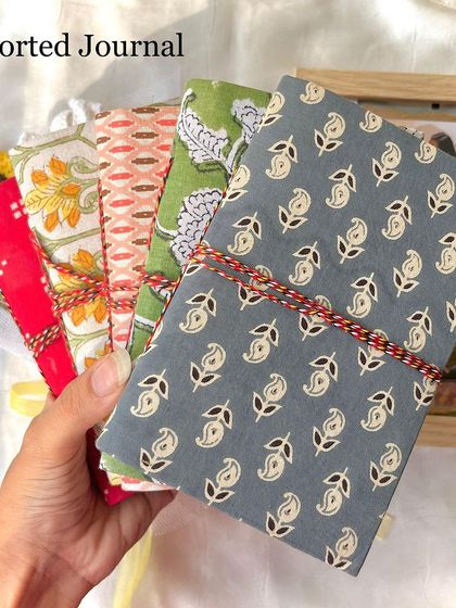 A collection of our assorted handmade journals, perfect for anyone who loves to write, sketch, or dream.