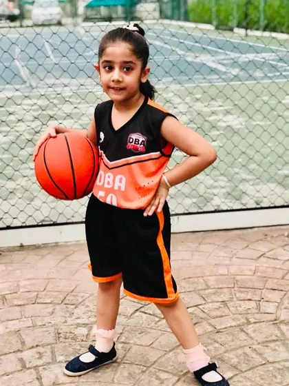 This young player, Danisha, is ready for her practice session. We encourage confidence and a positive attitude from day one.