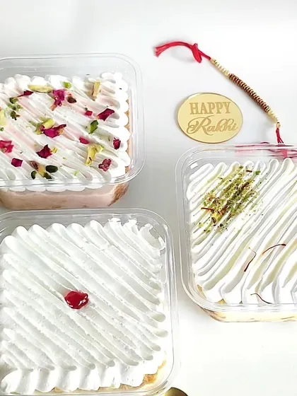My signature Tres Leches tubs are a true comfort dessert, and here you can see the full range of my fusion flavors. I offer the Classic, a rich Rasmalai version with pista and saffron, and a fragrant Rose flavor that tastes just like falooda.