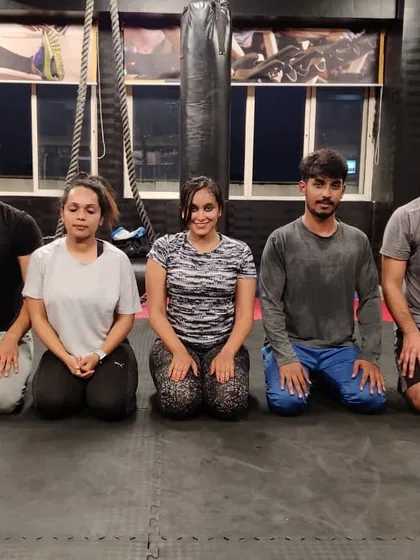 The RT Nagar crew taking a moment for a meditative, yet photogenic, pose after a tough session. This is our community.