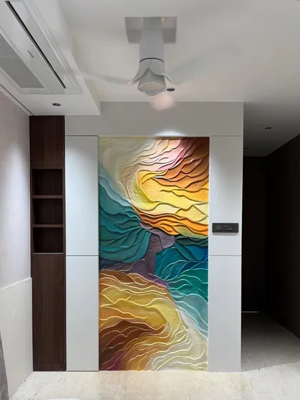 This view shows how the mural looks under different lighting, with the ceiling fan and spotlights creating a unique ambiance.