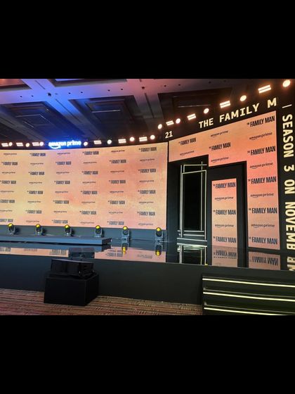 The stage before the audience arrives for 'The Family Man' launch, showcasing the branding and set design we work with.