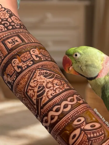 Yes, I can even include your beloved pets in your bridal henna! This custom design features a bride's parrot, along with other traditional motifs like elephants and dhol, making it truly one of a kind.