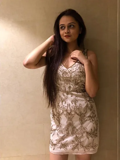 This embellished mini dress is pure glamour. The intricate beadwork catches the light beautifully, making it a perfect choice for a night out or a celebratory event where you want to feel lit.