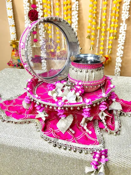 My 'Chaand' collection for Karvachauth is all about elegance. This handcrafted thali set in pink features delicate floral work and gota patti details, blending traditional values with a modern aesthetic for your special day.