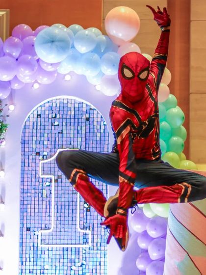 Our Spiderman performer strikes a dynamic, mid-air pose, making for an incredible photo opportunity at this first birthday party. We bring the action right to you.