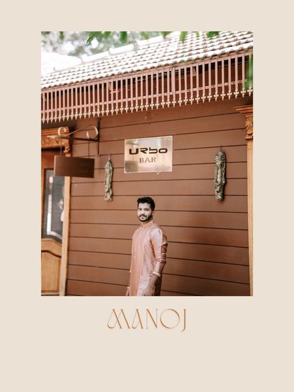 A cool and casual groom portrait from a pre-wedding event. His simple yet stylish kurta and the rustic background create a relaxed and happy vibe.