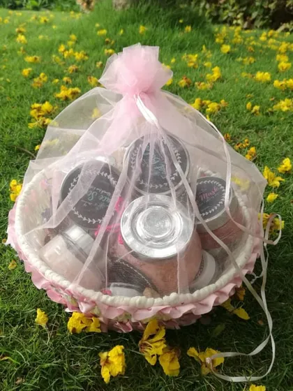 A lovely gift basket of my skincare products, wrapped in pink tulle. This makes a perfect present for someone who deserves a little pampering.