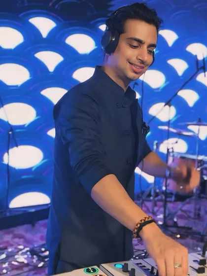 When the music hits just right, everything feels perfect. A candid shot of me enjoying the groove against a cool, patterned backdrop.