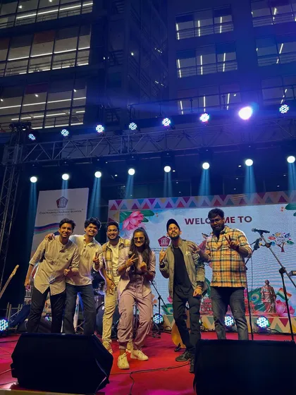 A post-show picture with the live band at the carnival. We rocked the stage together.