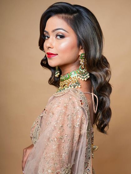 A beautiful side profile that highlights the jawline contour and the elegant hairstyle. You will learn to enhance your client's best features.