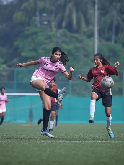 A player executing a volley, a display of advanced technical skill.