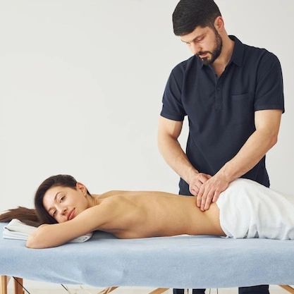 Focusing on the lower back area to relieve stiffness and pain. This technique is part of my deep tissue pain relief massage service.