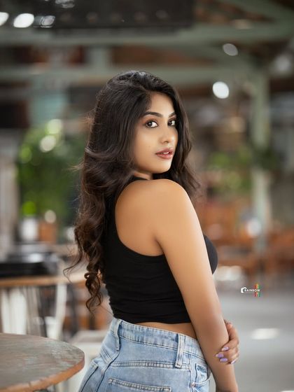 A classic over-the-shoulder look from Pooja Ramesh during our lifestyle shoot. The blurred background keeps the focus entirely on her.