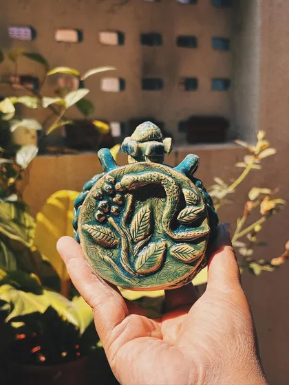 This student came in as a beginner, but her pieces look anything but. Her curious nature made her try things without overthinking, resulting in this bold and dramatic dragon jar and other wonderfully experimental pieces.
