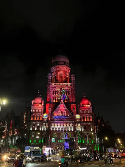 The BMC building illuminated with a projection mapping display for Independence Day. My night photography specializes in capturing these large-scale light shows.