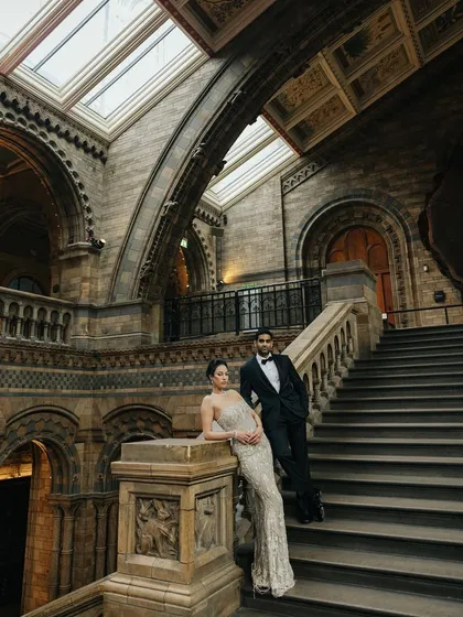 Julia and Aditya in a moment of quiet grandeur at the Natural History Museum in London. This post wedding editorial shoot highlights my ability to blend high fashion with architectural beauty for a truly international feel.