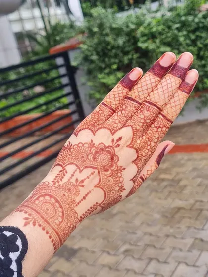 A close-up of the Eid henna stain, showing the crisp lines and deep color.