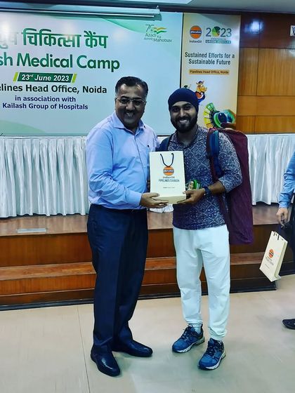 Receiving a token of appreciation after a wonderful Ayurveda and yoga medical camp at the IOCL Pipelines Head Office in Noida.