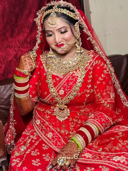 Another angle of this royal bride, showcasing the detailed jewellery and how the makeup complements the entire ensemble.