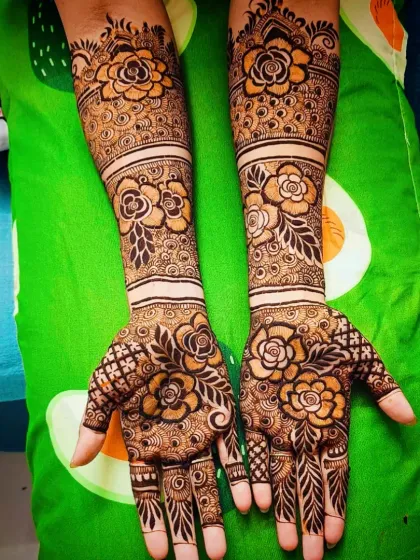 A full-coverage floral design with large, beautiful roses as the main feature.