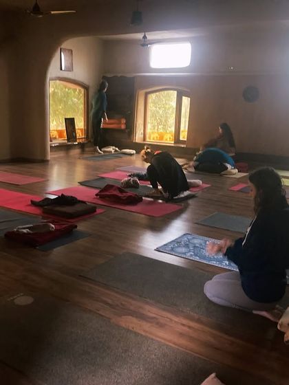 Sometimes, the only place to go is inward. A moment of quiet meditation during a group class, finding stillness amidst the movement.