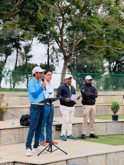 A player addresses the audience at a prize distribution ceremony. We encourage our athletes to develop public speaking skills and confidence off the course as well.